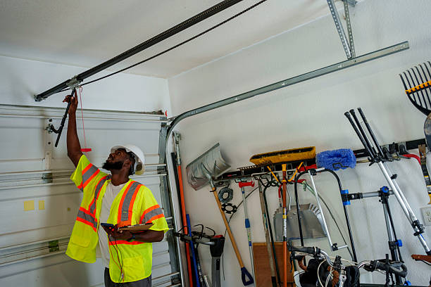 Professional Garage Door Panel Replacement technician working in East Dubuque, IL